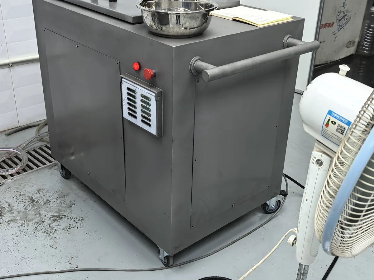 Stainless servo water dosing machine used with the HM-300HP mixer during a factory test