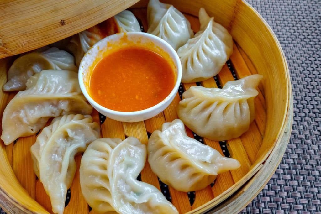 Dumpling application for vacuum-mixed dough