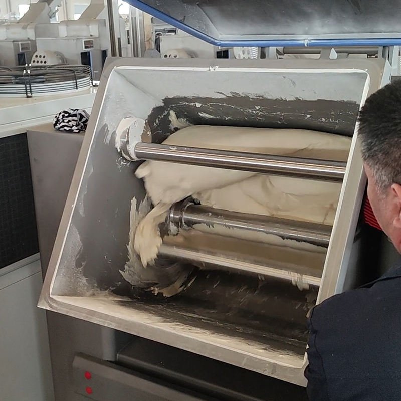 Open mixing chamber with dough