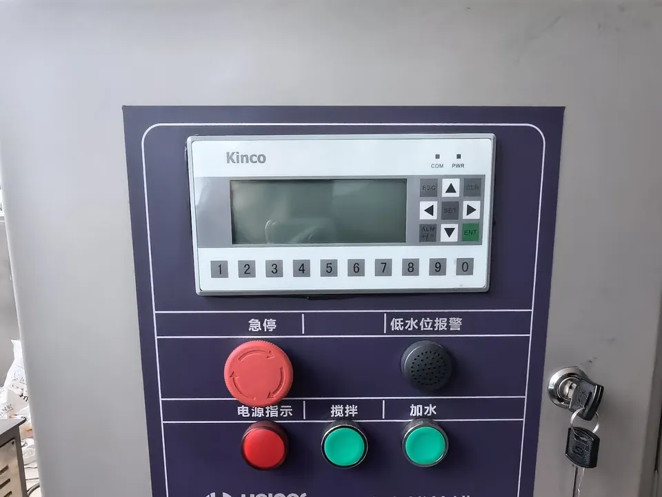 Kinco operator interface with emergency stop, low-level alarm, mixing and water-addition controls