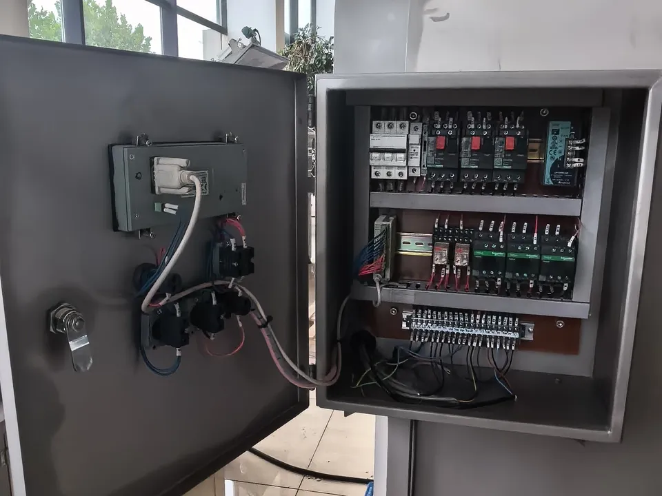 Open electrical cabinet on the HELPER saltwater mixing tank