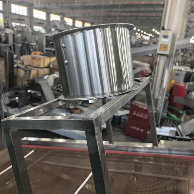 Overhead fan housing — original three-tier cooling conveyor photograph