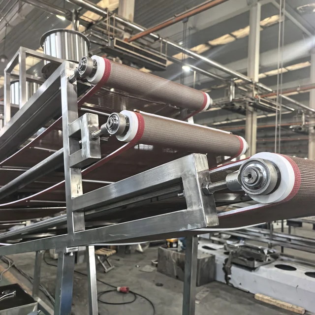 Tier ends and adjustment hardware — original three-tier cooling conveyor photograph