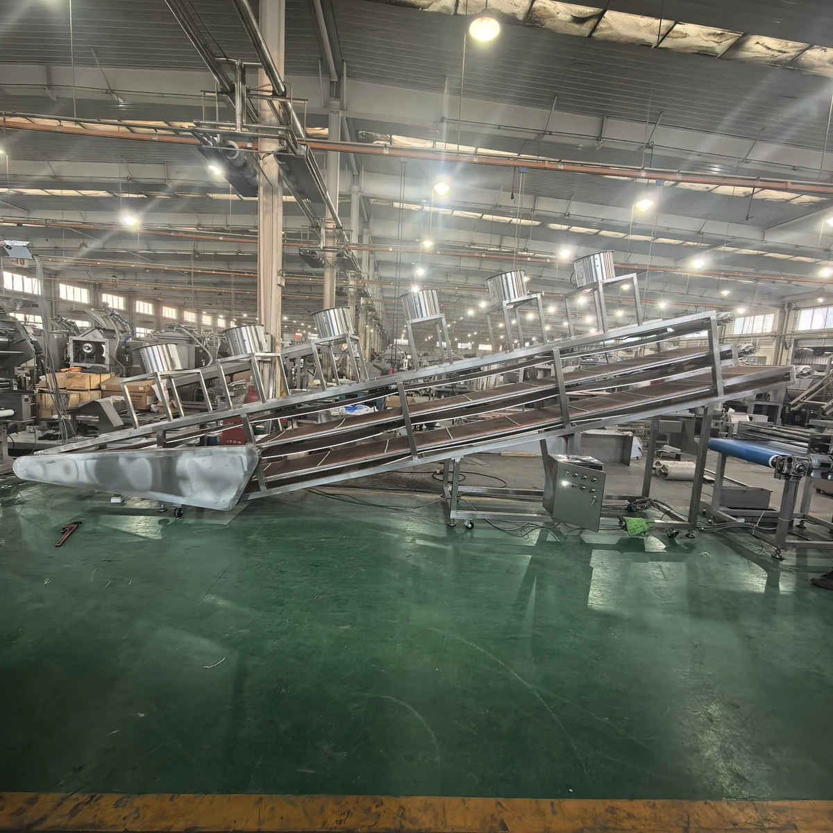 Original workshop photograph of the three-tier noodle air-cooling conveyor